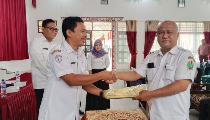 Amos Panggabean SPd MPd Jabat Kepala SMAN 1 Panombeian Pane